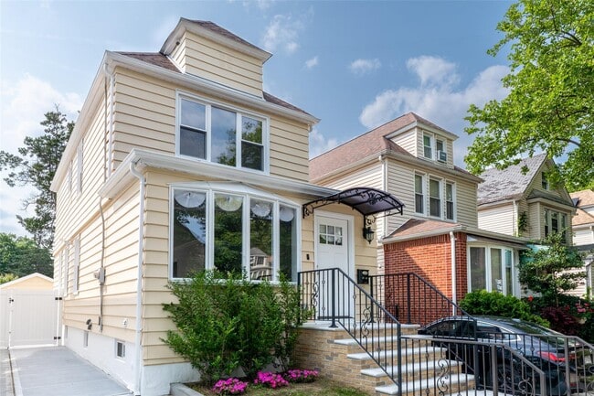 property at 90-09 69th Ave