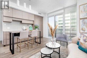 8 Eglinton Ave E in Toronto, ON - Building Photo - Building Photo