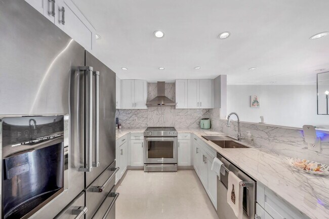 property at 5838 Collins Ave