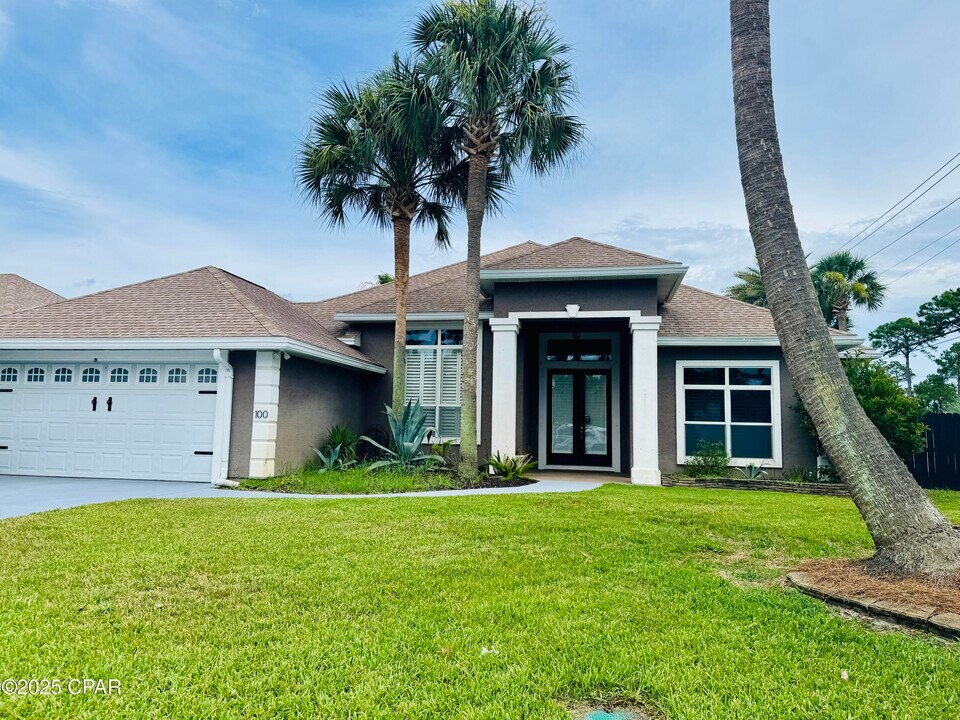 100 Palm Bay Blvd in Panama City Beach, FL - Building Photo