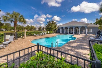 9437 Flowering Cottonwood Rd in Orlando, FL - Building Photo - Building Photo