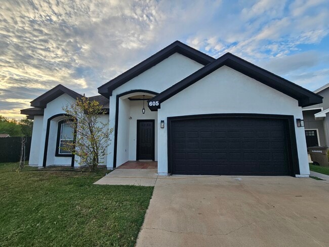 property at 605 S Excalibur St