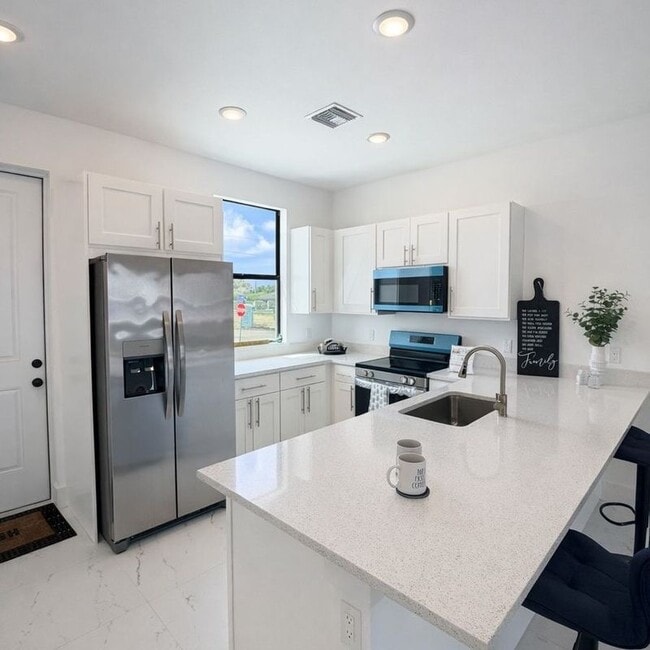 2416 Xelda Ave N in Lehigh Acres, FL - Building Photo - Building Photo