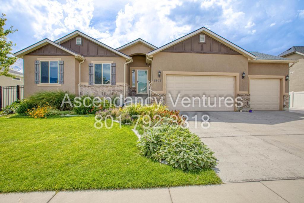 5975 Spring St in Stansbury Park, UT - Building Photo
