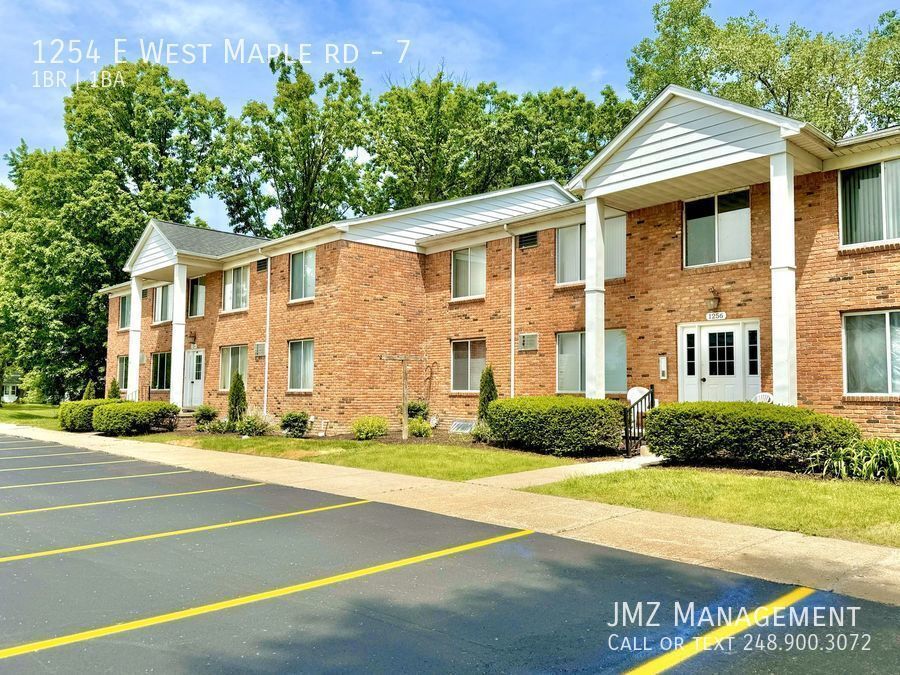 1254 E West Maple Rd-Unit -7 in Walled Lake, MI - Building Photo