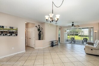 400 Trotter Ln, Unit 102 in Melbourne, FL - Foto de edificio - Building Photo