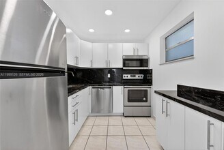 8250 Byron Ave in Miami Beach, FL - Building Photo - Building Photo