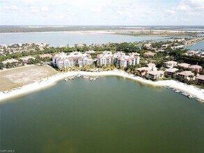 10050 Valiant Ct-Unit -201 in Miromar Lakes, FL - Building Photo - Building Photo