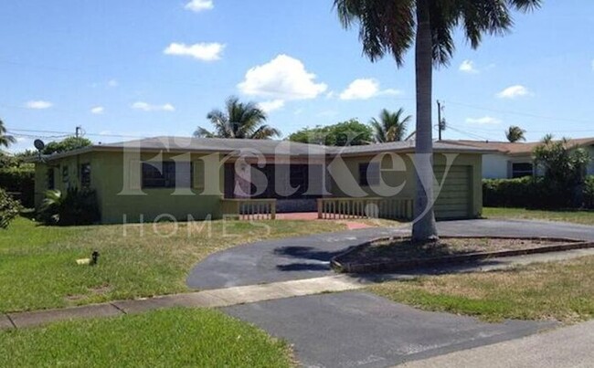 property at 5640 NW 13th Ct