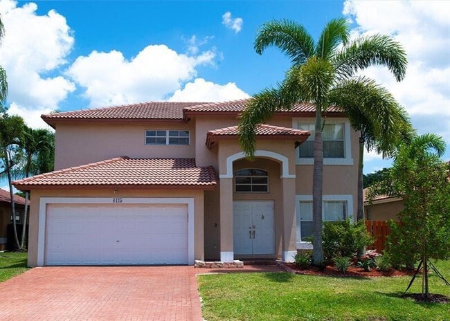 property at 6125 NW 40th St