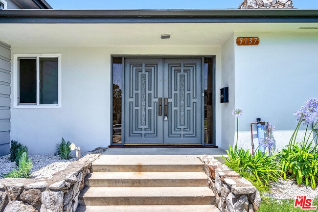 property at 5137 Reynier Ave