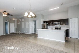 411 SW Log Dr in Port St. Lucie, FL - Building Photo - Building Photo