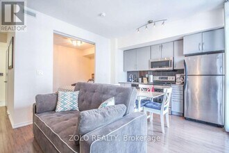 65-2065 Bremner Blvd in Toronto, ON - Building Photo - Building Photo