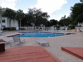 11205 W Atlantic Blvd-Unit -208 in Coral Springs, FL - Building Photo - Building Photo