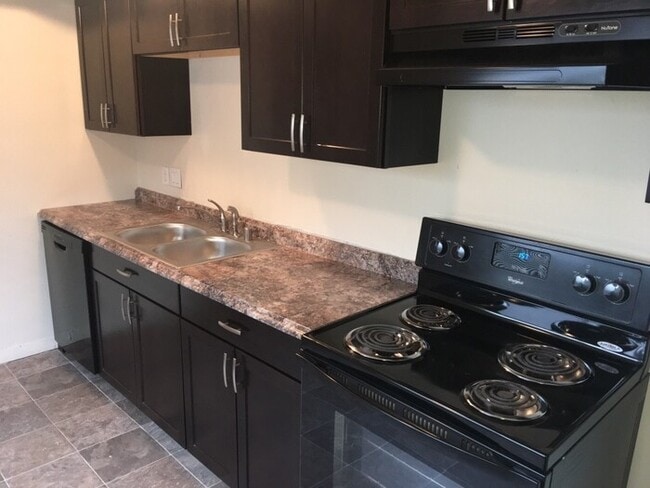 property at 1233 E 11th St