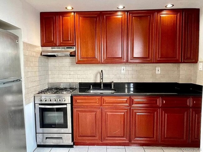 property at 40-37 77th St