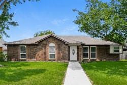 7717 Swiss Way in Rowlett, TX - Building Photo