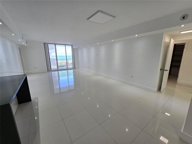 property at 5825 Collins Ave