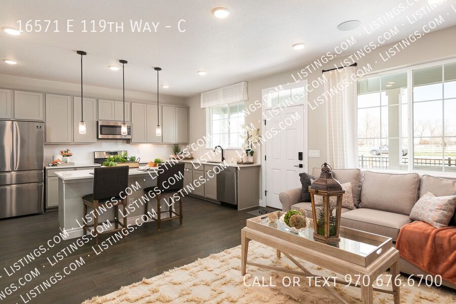 16571 E 119th Way in Commerce City, CO - Building Photo