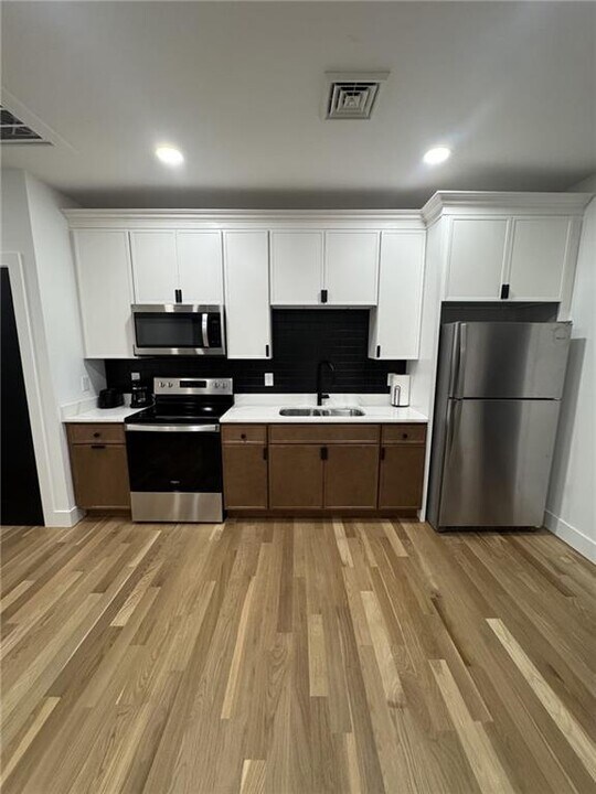 1002 Broad St-Unit -8 in Central Falls, RI - Building Photo
