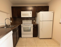 9410 Poinciana Pl, Unit 403 in Davie, FL - Foto de edificio - Building Photo