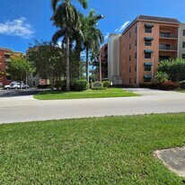 1610 Presidential Way, Unit 105 in West Palm Beach, FL - Building Photo
