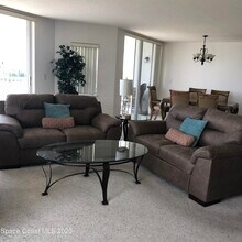 8935 Puerto Del Rio Dr in Cape Canaveral, FL - Building Photo - Building Photo