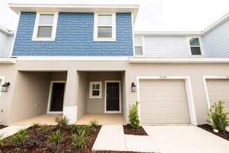 7649 WATERSCAPE Dr in Groveland, FL - Building Photo - Building Photo