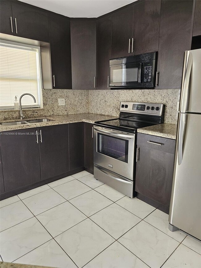 6685 W 26th Ct, Unit 202-8