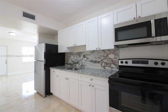 property at 3014 NW 6th St