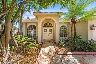 5872 NW 73rd Ct in Parkland, FL - Building Photo - Building Photo