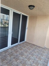 121 Golden Isles Dr, Unit 405 in Hallandale Beach, FL - Building Photo - Building Photo