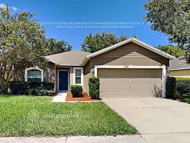 property at 5848 Windsong Oak Dr