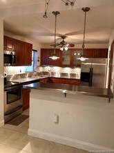 830 NE 199th St-Unit -104B in Miami, FL - Building Photo - Building Photo