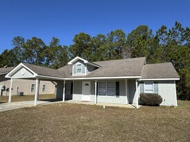 214 Hibiscus St in Waveland, MS - Building Photo