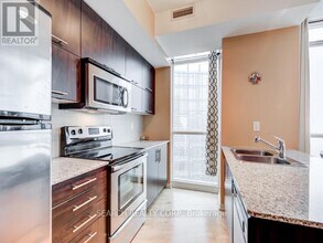 65-3765 Bremner Blvd in Toronto, ON - Building Photo - Building Photo