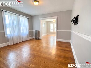 80 Langley Rd, Unit 1 in Boston, MA - Building Photo - Building Photo