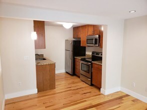 2460 W Caithness Pl-Unit -106 in Denver, CO - Building Photo - Building Photo