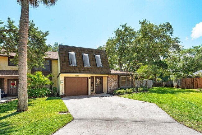 1048 Raintree Dr in Palm Beach Gardens, FL - Building Photo - Building Photo