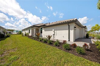 19597 Hinkley Dr in Estero, FL - Building Photo - Building Photo
