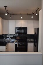 9079 E. Panorama Circle, Unit 404 in Centennial, CO - Foto de edificio - Building Photo