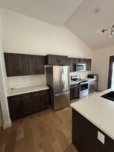 100-102 E Maplewood Ln in Raymore, MO - Building Photo - Building Photo