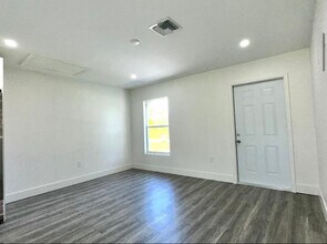 1949 Quintero Ln in Lehigh Acres, FL - Building Photo - Building Photo