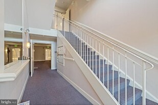 8901 Stone Creek Pl in Pikesville, MD - Building Photo