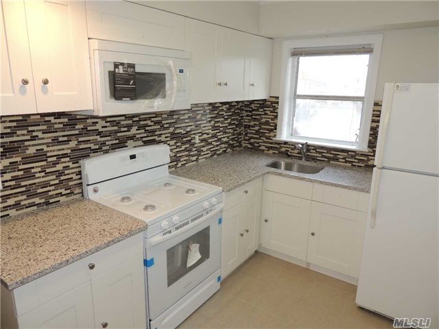 51 Baisley Ave in East Rockaway, NY - Building Photo