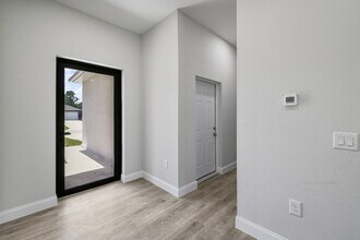 1051 Milwaukee Blvd in Lehigh Acres, FL - Building Photo - Building Photo