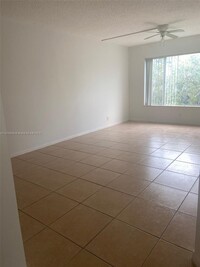 3231 NW 103rd Ter, Unit 208-C in Coral Springs, FL - Building Photo - Building Photo