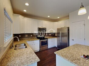 15722 E 96th Way in Commerce City, CO - Building Photo - Building Photo