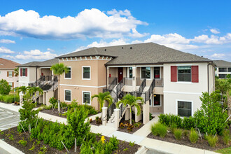 Bella Via at Port Charlotte in Port Charlotte, FL - Building Photo - Building Photo