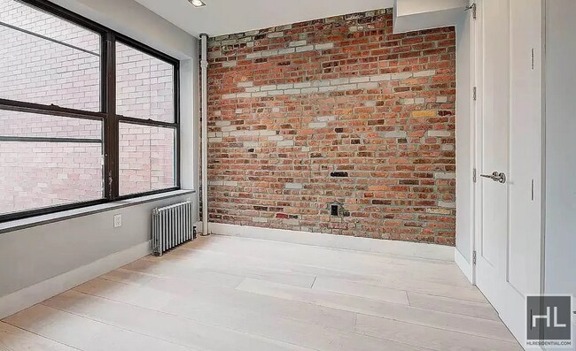 Stanton Street, Unit 6A in New York, NY - Building Photo - Building Photo